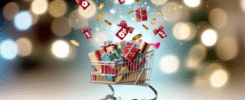 alt_text: A festive cover image with a shopping cart of gifts, showcasing savings tips for budget-friendly holidays.